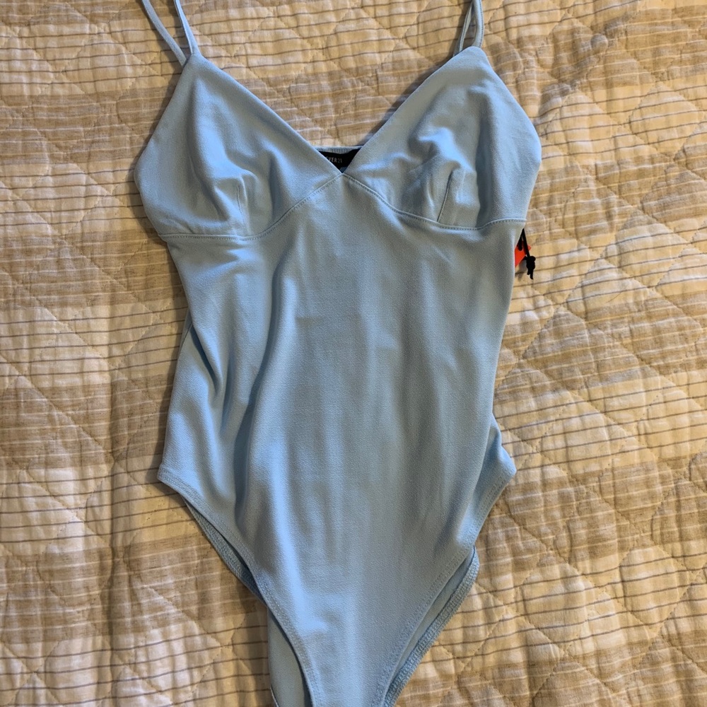 NWT baby blue bodysuit !!!